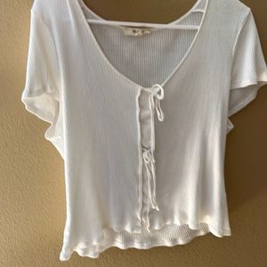 White simple yet cute top.